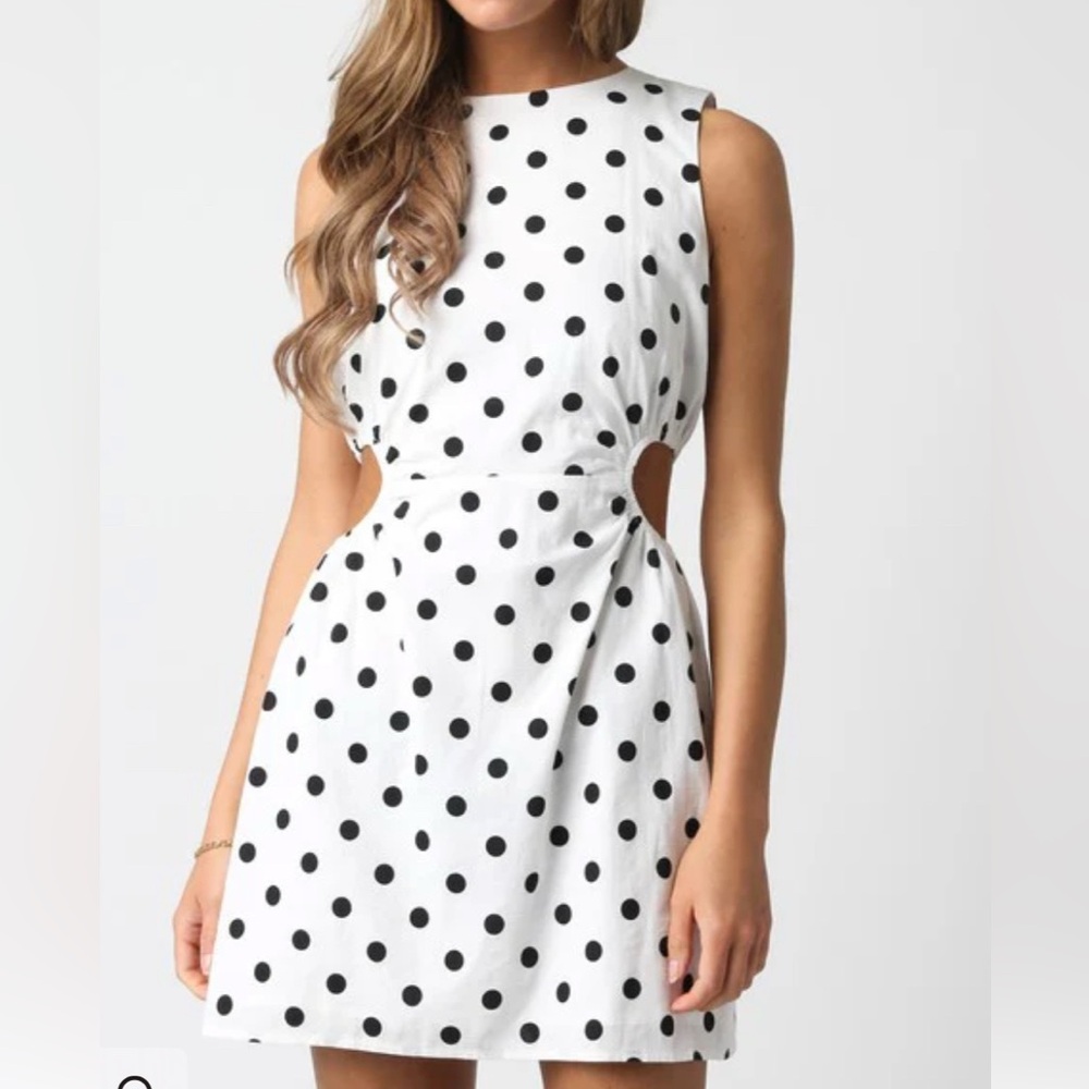 Polka dot mini dress with cut outs